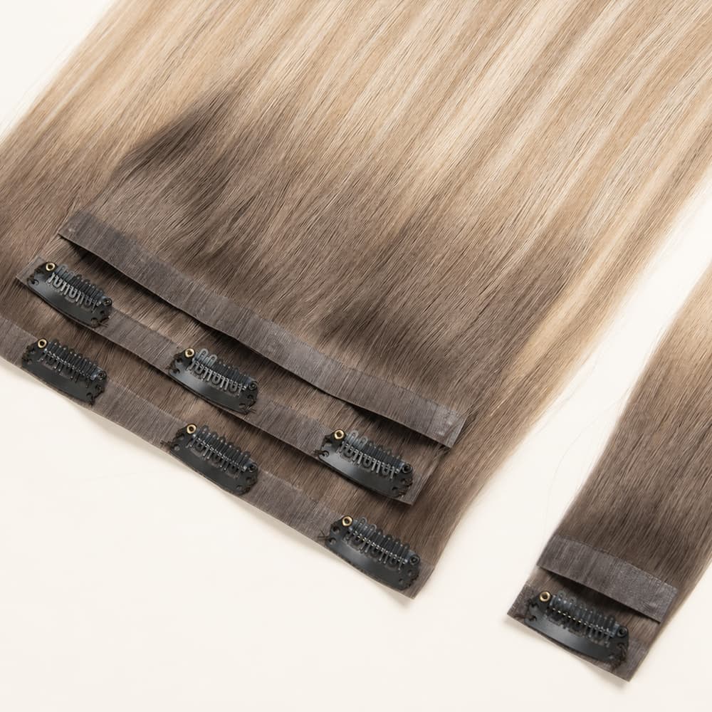 Clip-in human hair extension pieces in blended shades