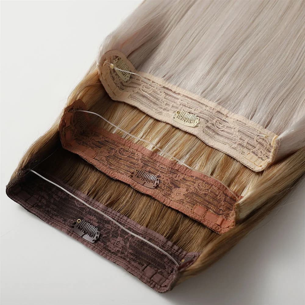 Three Halo Hair pieces in blonde and brown shades showing their bases, clips and clear support wires