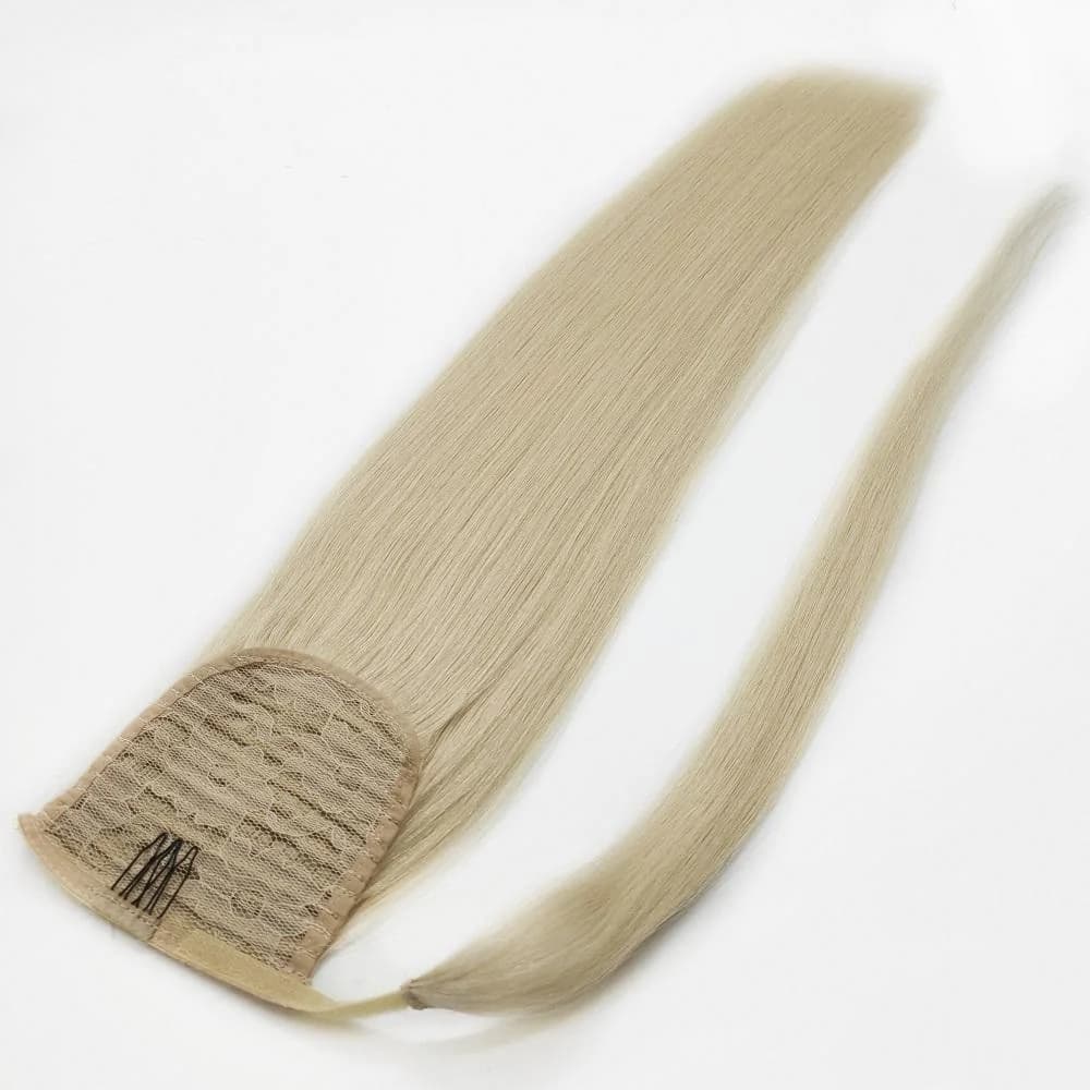 Light blonde ponytail hair piece showing its base, comb clip and wrap strand
